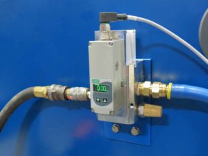 AFPCS Pump Regulator and Flow Sensor Mounted to Filter Press